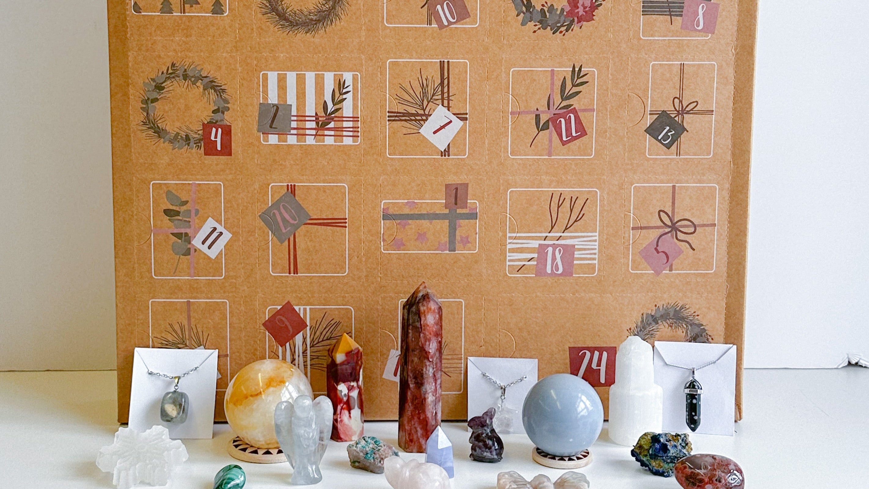 Advent calendar with small items on a white surface