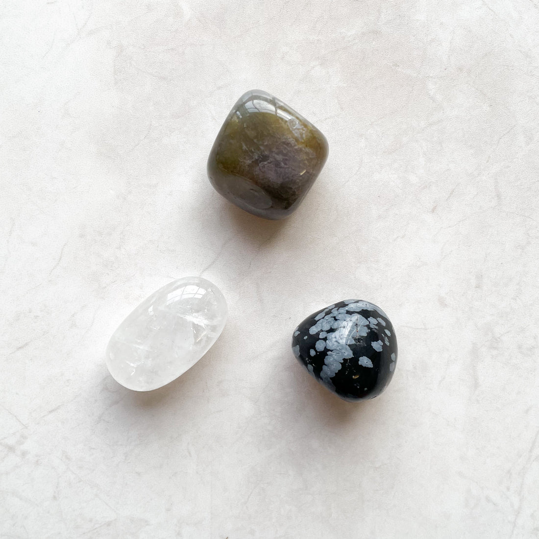 Sagittarius and Crystals: Exploring Snowflake Obsidian, Ocean Jasper, and Clear Quartz