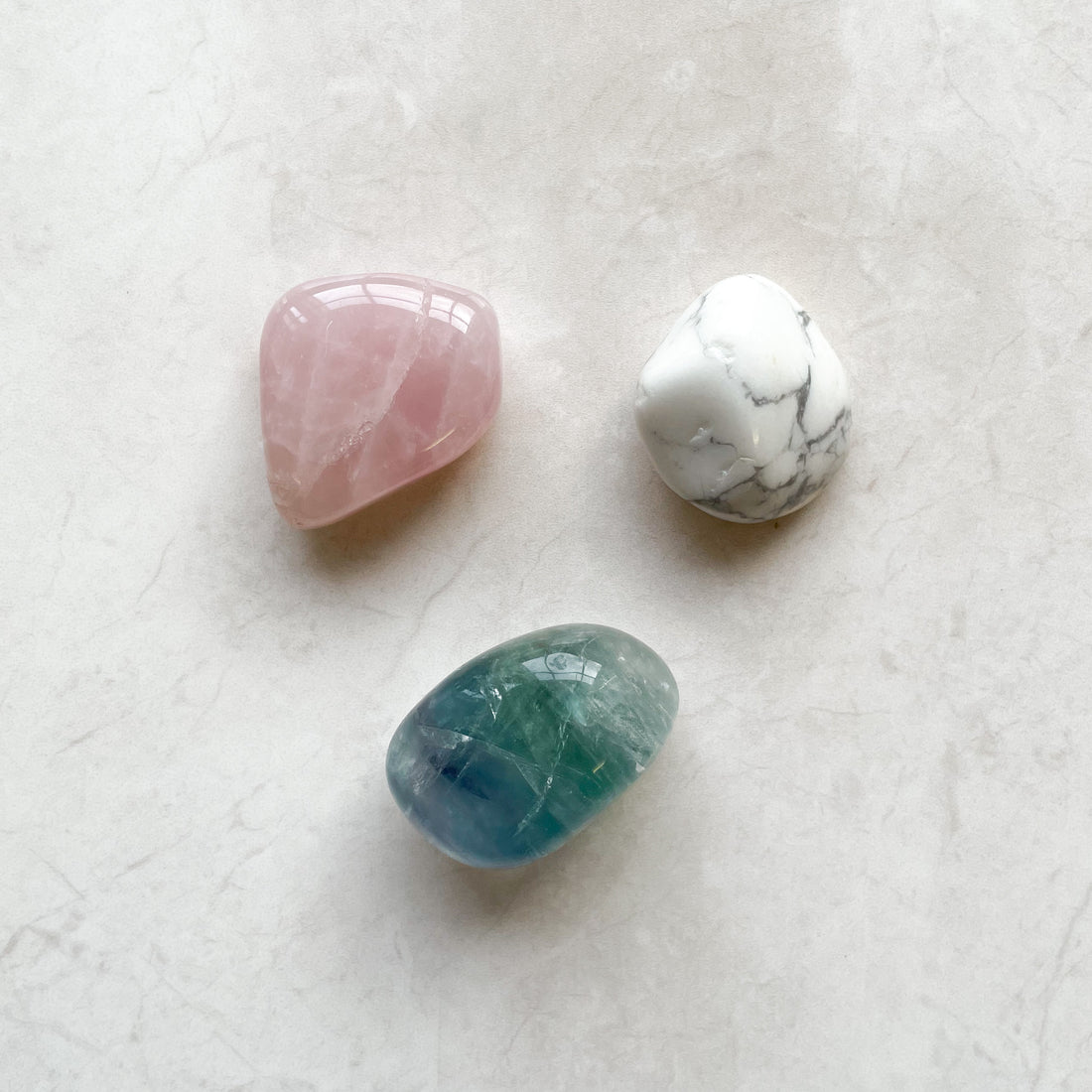 The Grounded Ambition of Capricorn: Exploring the Power of Fluorite, Rose Quartz, and Howlite