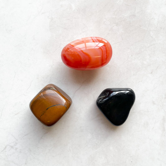 Crystals for the Star Sign Leo, embracing your inner fire. Carnelian, Tiger's Eye, and Black Onyx