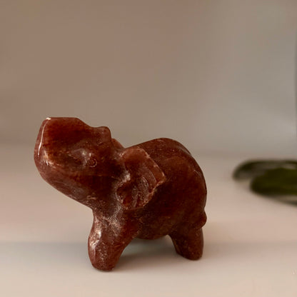 a pink strawberry quartz crystal elephant