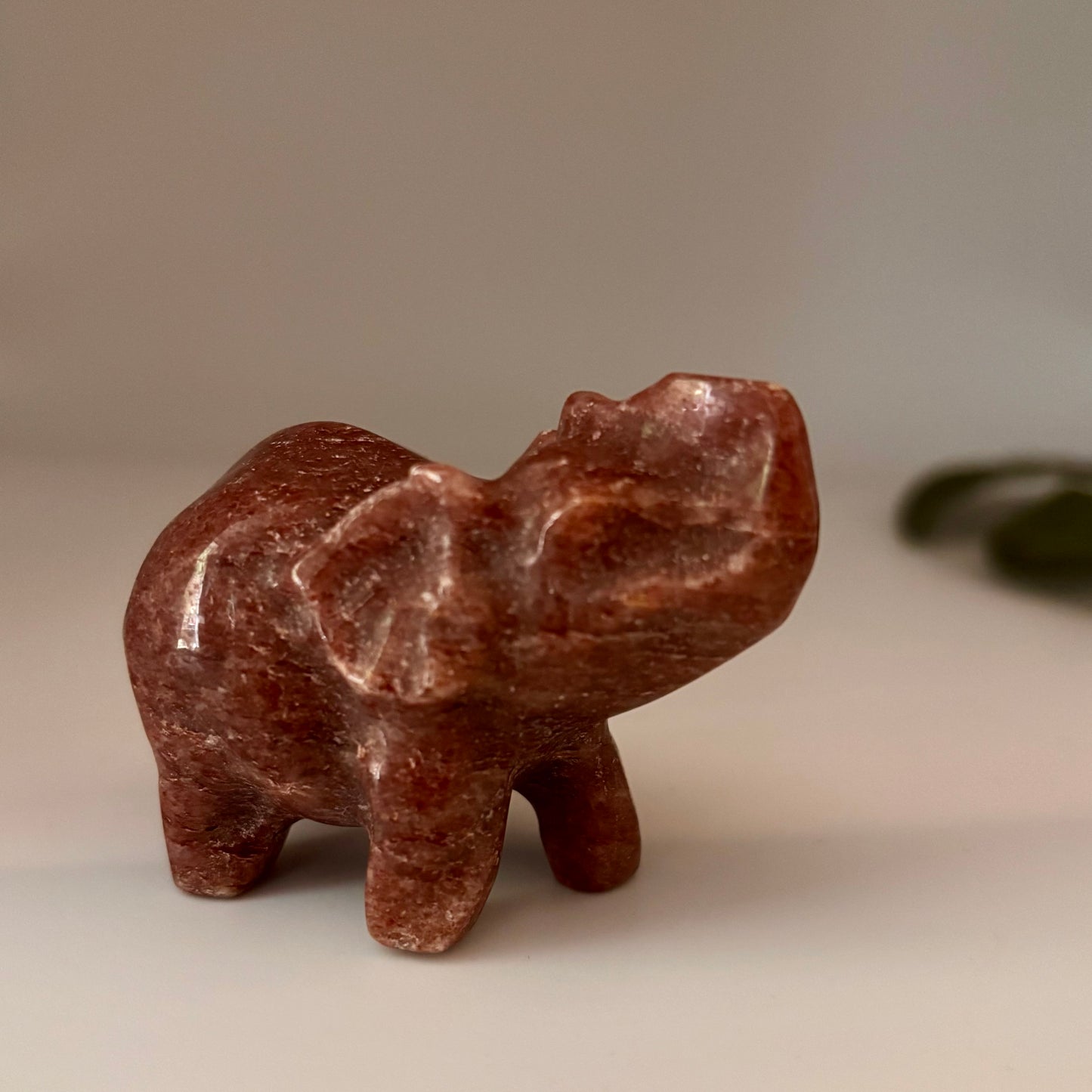 a pink strawberry quartz crystal elephant